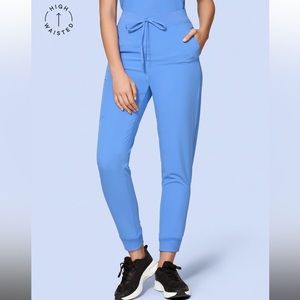 1x Fabletics Scrub Set, light blue (surgical blue) top and bottom.